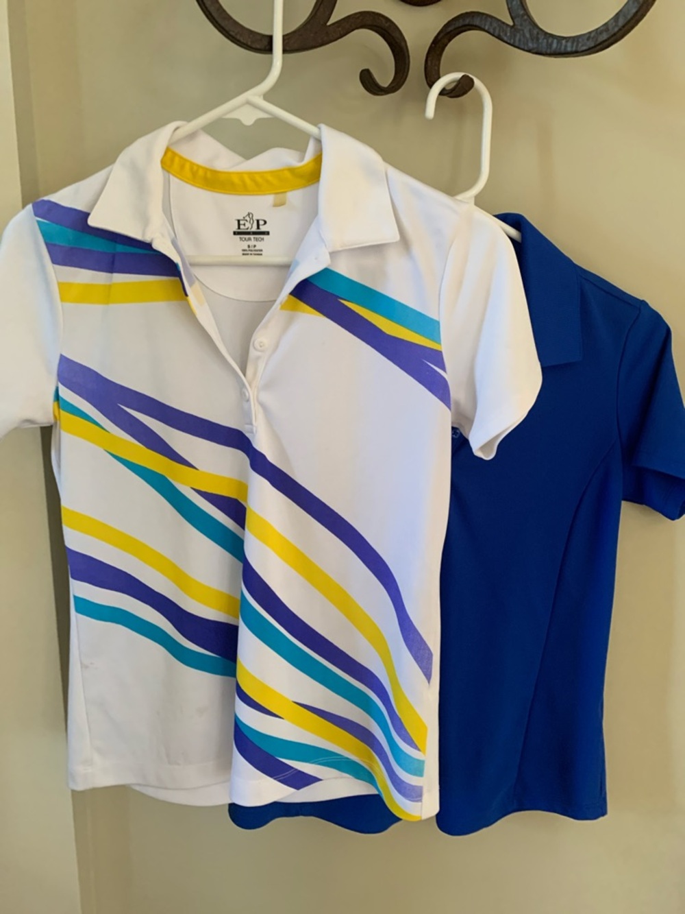 EP and Greg Norman S/P White Polo with Blue, Yellow & Teal Stripes. Two .